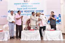 Hon'ble Governor felicitated Shri Pundalik Naik, renownwed Konkani Writer in a function held at Marcel.